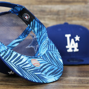 The undervisor of the Youth Los Angeles Dodgers MLB 2022 All Star Game Mesh Back 9Fifty Snapback Cap | ASG 2022 Royal Blue Trucker Hat