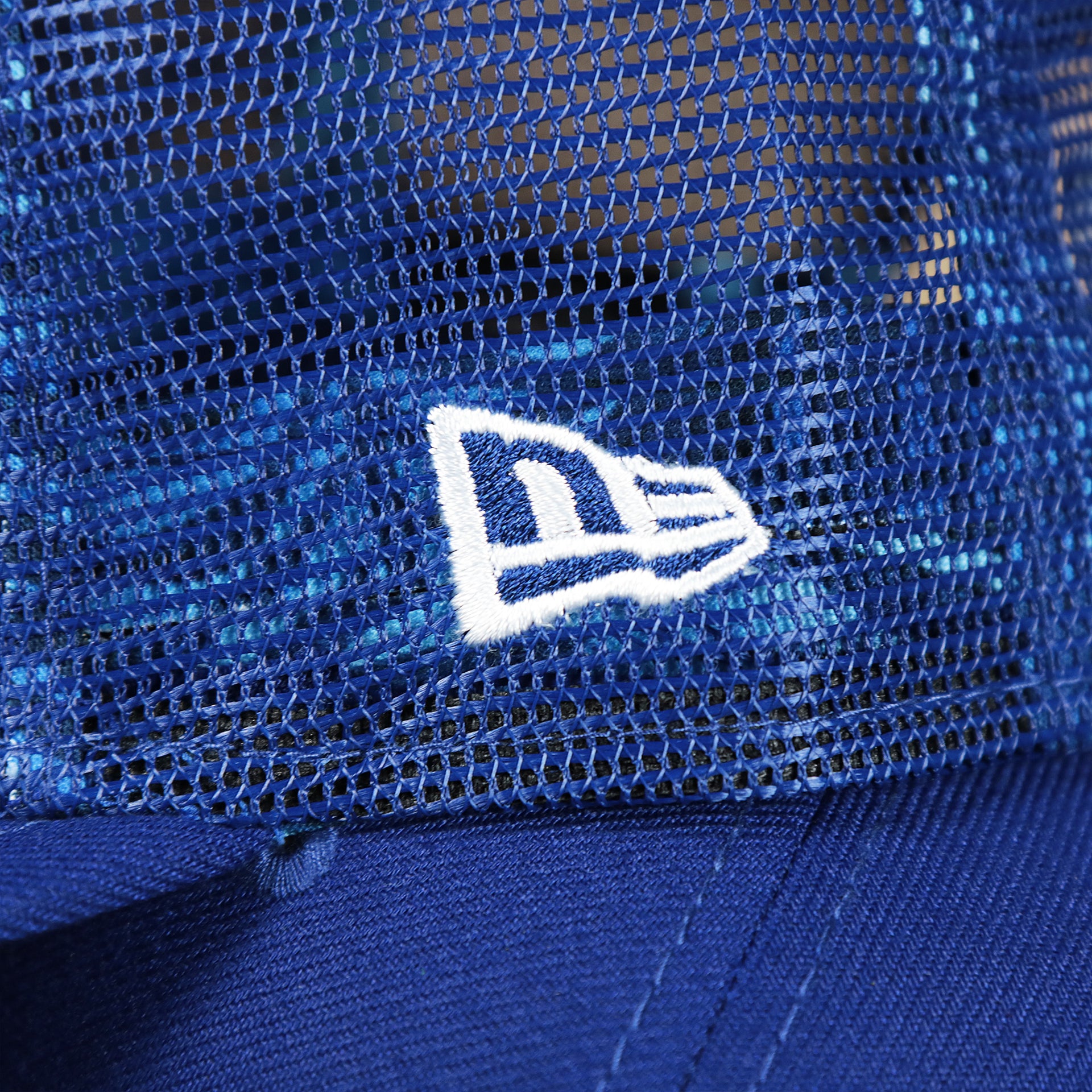 The New Era Logo on the Youth Los Angeles Dodgers MLB 2022 All Star Game Mesh Back 9Fifty Snapback Cap | ASG 2022 Royal Blue Trucker Hat
