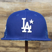 The front of the Los Angeles Dodgers Metallic All Star Game MLB 2022 Side Patch 9Fifty Mesh Snapback | ASG 2022 Royal Blue Trucker Hat