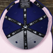The inside of the Los Angeles Dodgers Pop Sweat Pastel World Series Side Patch Fitted Cap With Pink Undervisor | Royal Blue 59Fifty Cap
