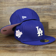 The Los Angeles Dodgers Pop Sweat Pastel World Series Side Patch Fitted Cap With Pink Undervisor | Royal Blue 59Fifty Cap