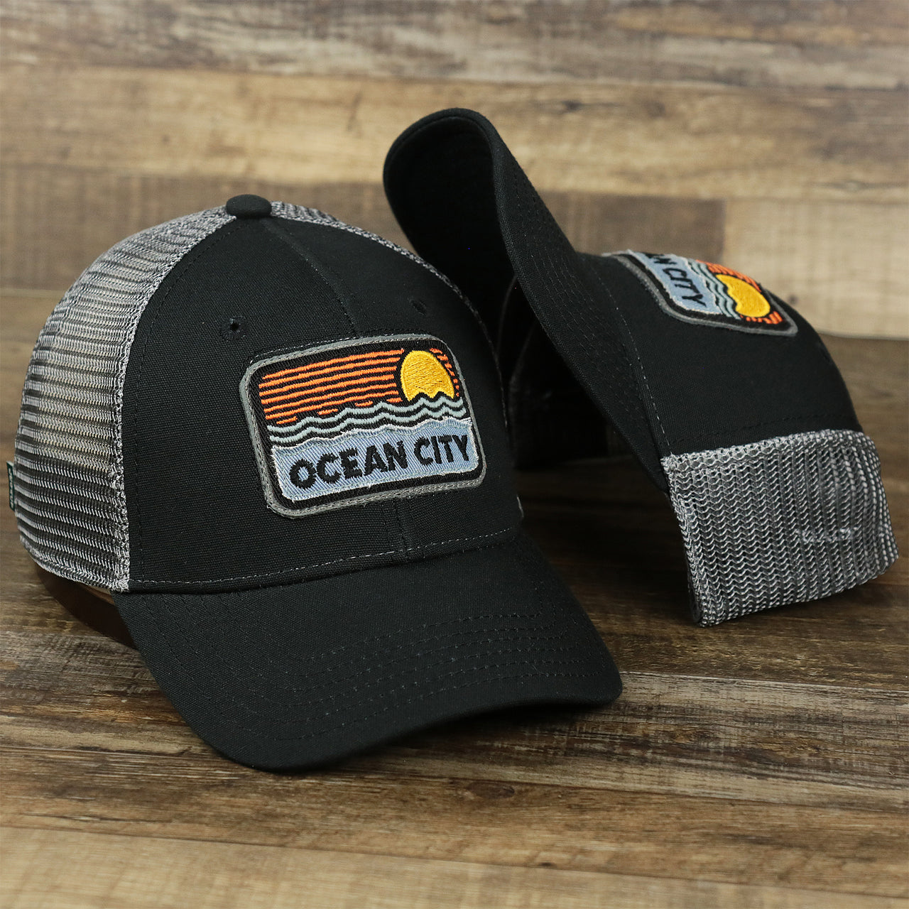 The Youth New Jersey Ocean City Sunset Mesh Back Trucker Hat | Black And Grey Mesh Youth Trucker Hat