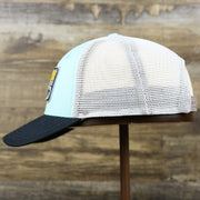 The wearer's left of the New Jersey Ocean City Sunset Mesh Back Trucker Hat | Black And Grey Mesh Trucker Hat