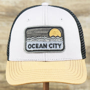 The front of the Youth New Jersey Ocean City Sunset Mesh Back Trucker Hat | Gray And Black Mesh Youth Trucker Hat