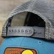 The Dark Gray Adjustable Strap on the Youth New Jersey Ocean City Sunset Mesh Back Trucker Hat | Marine Blue And Dark Gray Mesh Youth Trucker Hat