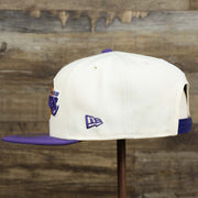 The wearer's left on the Youth Los Angeles Lakers NBA 2022 Draft Gray Bottom 9Fifty Snapback | New Era Cream/Purple