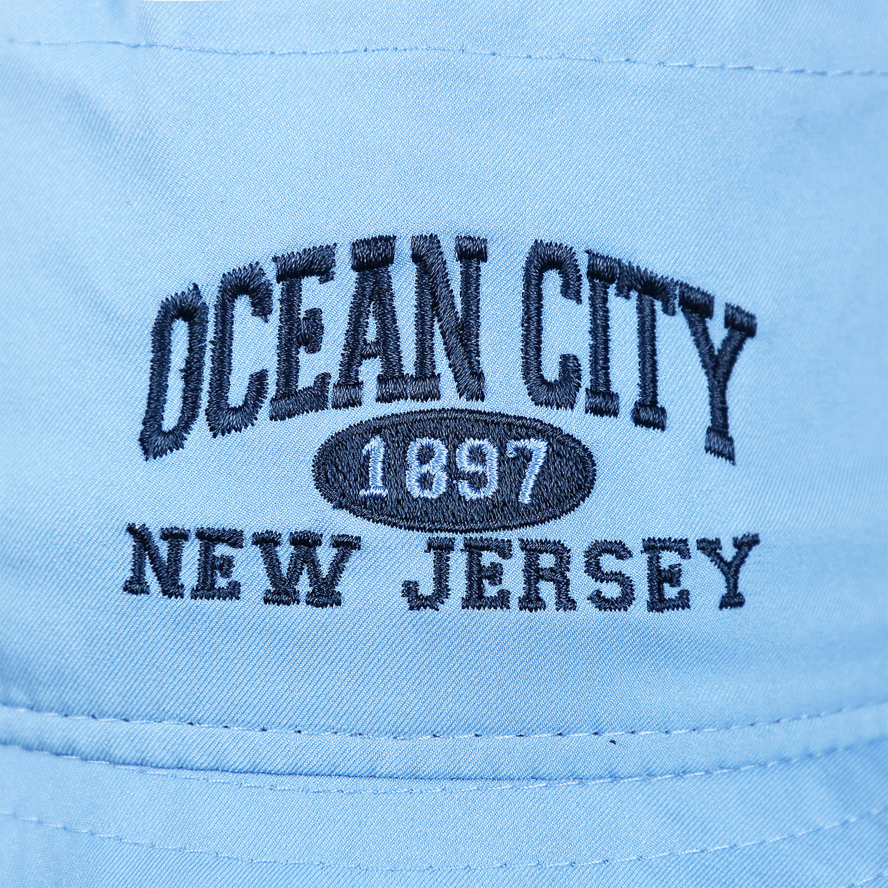 The Ocean City New Jersey Wordmark on the Ocean City New Jersey 1897 Bucket Hat | Light Blue Bucket Hat