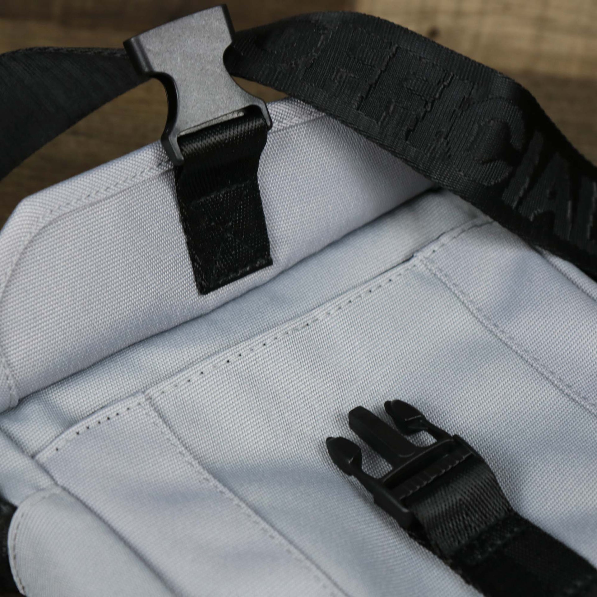 The clasp open on the Essential Nylon Shoulder Bag Streetwear with Mesh Pocket | Official Gray