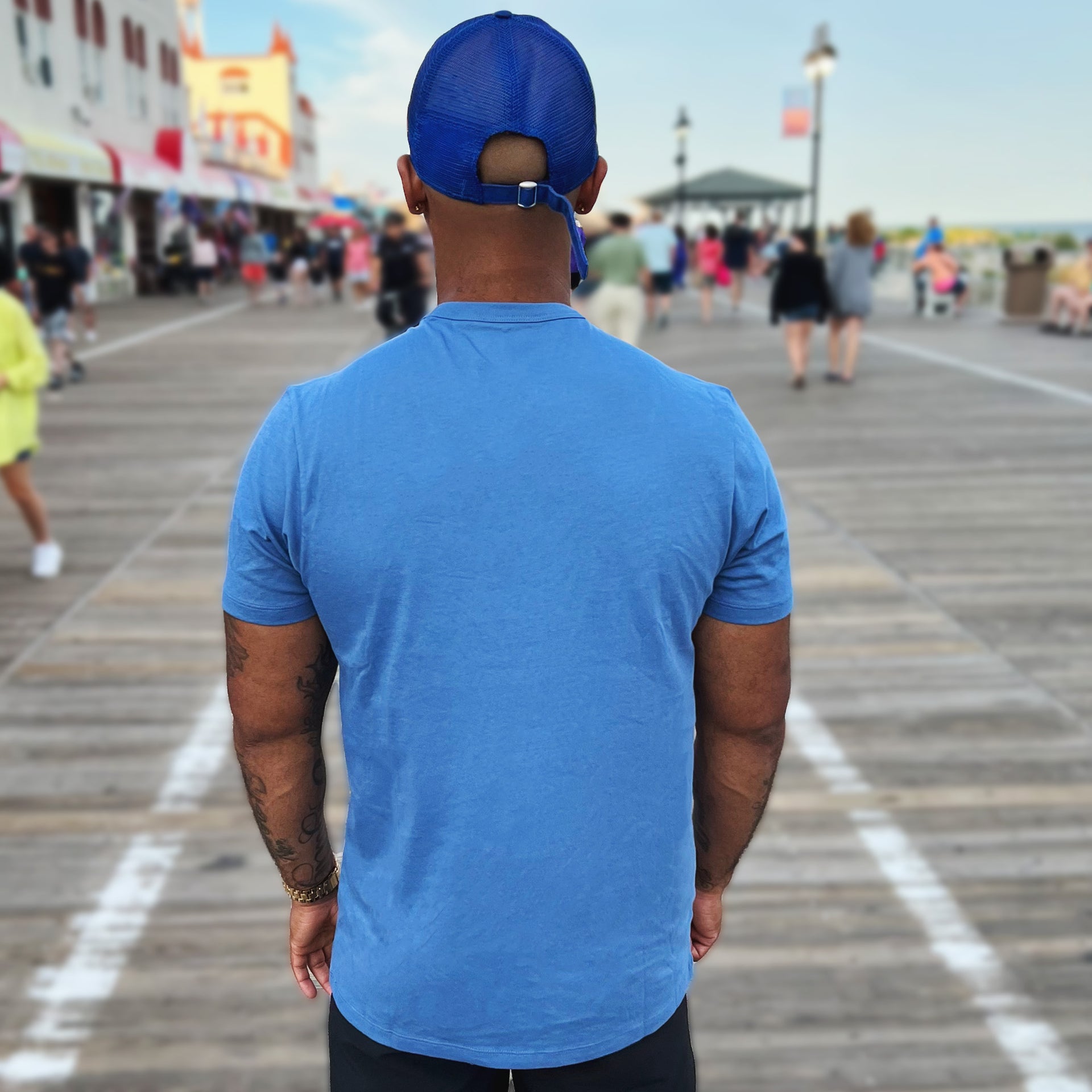 The backside of the New York Mets Retrograde Franklin New York Mets Wordmark And Logo TShirt | Cadet Blue TShirt
