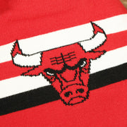 The Bulls Logo on the Chicago Bulls Long Knit Cuffless NFL Winter Pom Pom Beanie | Red Pom Pom Beanie