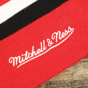 The Mitchell and Ness Wordmark on the Chicago Bulls Long Knit Cuffless NFL Winter Pom Pom Beanie | Red Pom Pom Beanie