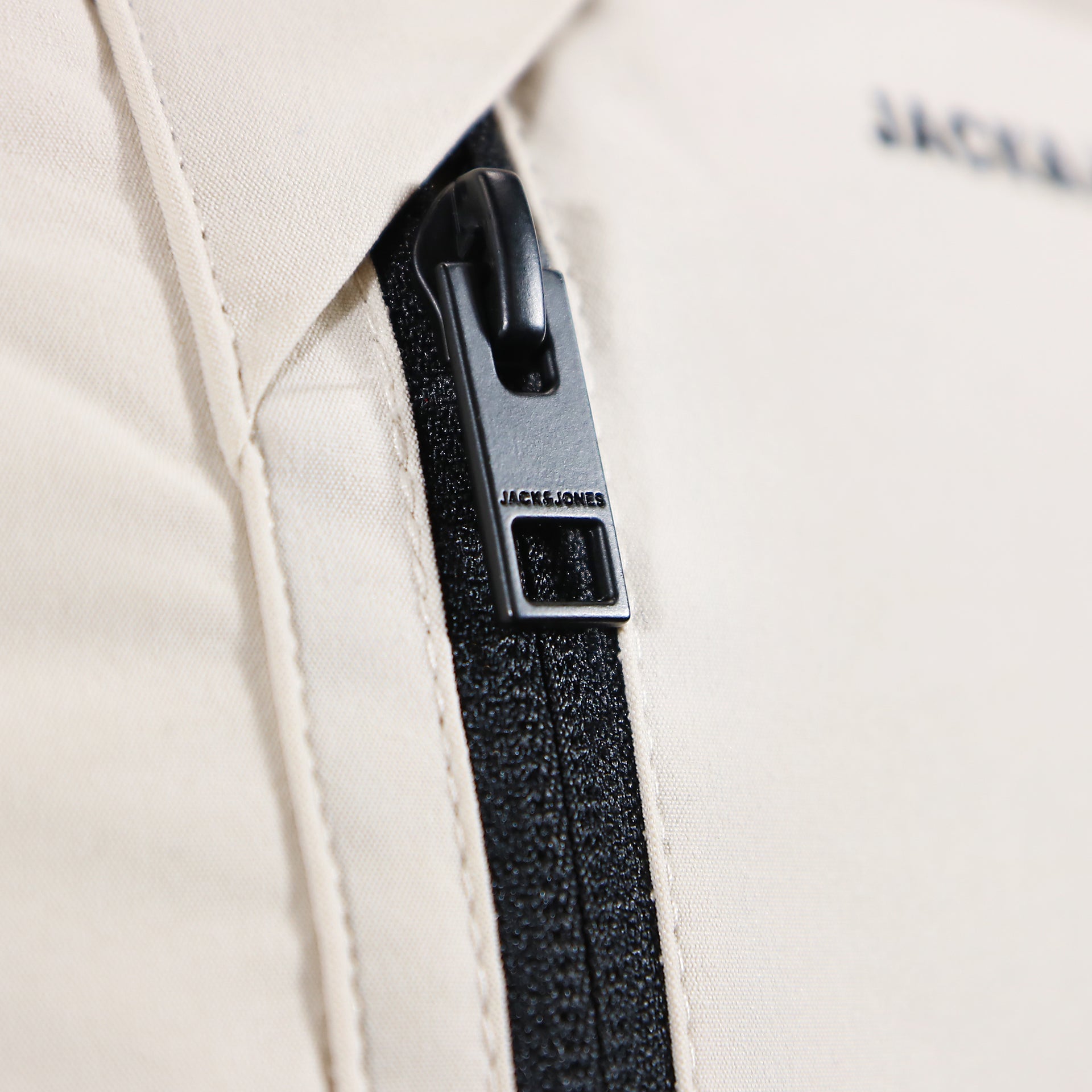 The Jack and Jones Zipper on the Jack And Jones Moonbeam Puffer Jacket With Hidden Pocket | Cream Puffer Jacket