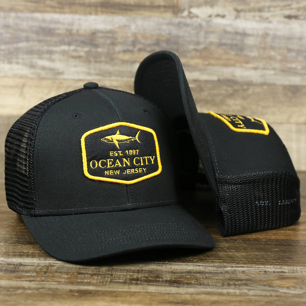 The Ocean City New Jersey Shark Patch Mesh Back Trucker Hat | Black Mesh Snapback