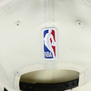The NBA Jerry West Logo on the back of the Orlando Magic NBA 2022 Draft Gray Bottom 9Fifty Snapback | New Era Cream/Black