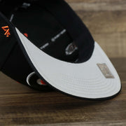 The Gray Undervisor on the Philadelphia Flyers Side Patch Dugout Side Defender Fitted Cap | Black Stretch Fitted Cap