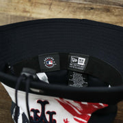 The MLB Merchandise Tag and New Era Tag on the Stars And Stripes New York Mets 4th of July Bucket Hat | New Era Navy OSFM