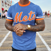 The front of New York Mets Wordmark Otis Ringer Tshirt With Orange And White Striped Sleeves | Cadet Blue T-Shirt