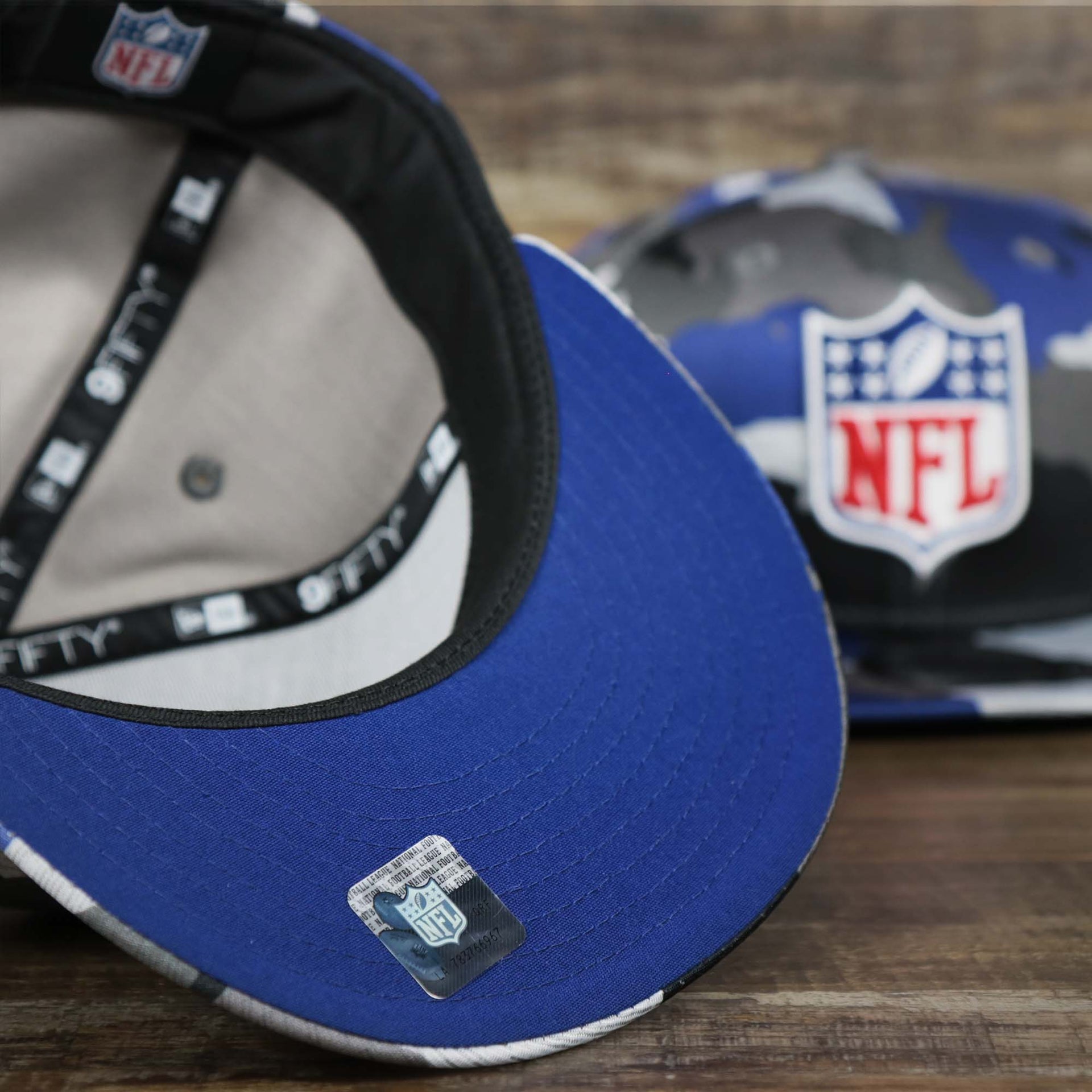 The undervisor on the NFL Logo OnField Summer Training 2022 Camo 9Fifty Snapback | Royal Blue Camo 9Fifty