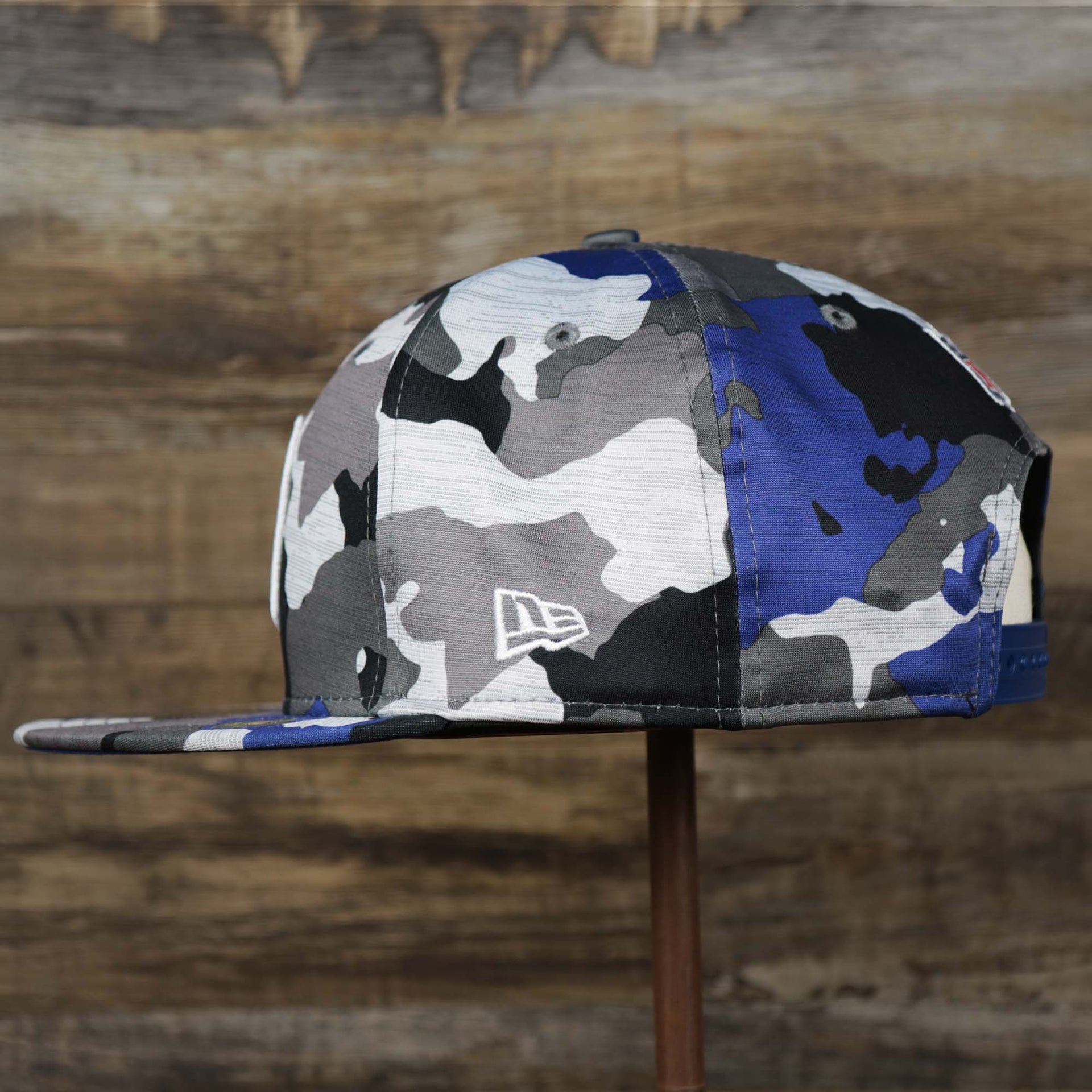 The Wearer's Left on the NFL Logo OnField Summer Training 2022 Camo 9Fifty Snapback | Royal Blue Camo 9Fifty