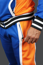 A close up of the Zipper Pocket on the NYC Basketball Varsity Athletic Track Pants Jordan Craig