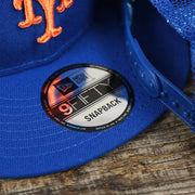 The 9Fifty Sticker on the New York Mets Metallic All Star Game MLB 2022 Side Patch 9Fifty Mesh Snapback | ASG 2022 Royal Blue Trucker Hat
