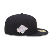 The World Series Side Patch on the New York Yankees Pop Sweat Pastel World Series Side Patch Fitted Cap With Pink Undervisor | Navy Blue 59Fifty Cap