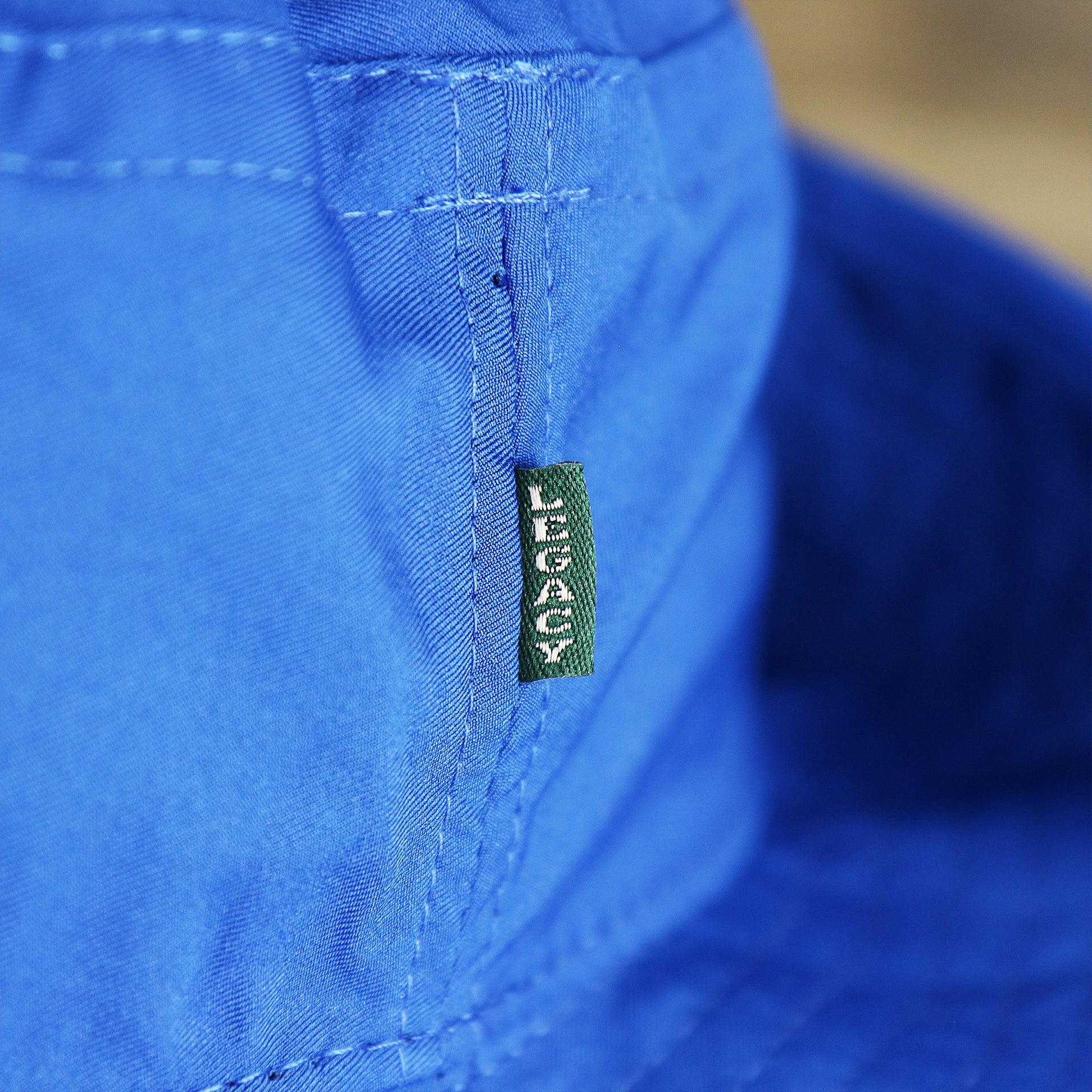 The legacy Tag on the Ocean City New Jersey Wordmark Since 1897 Bucket Hat | Royal Blue Bucket Hat