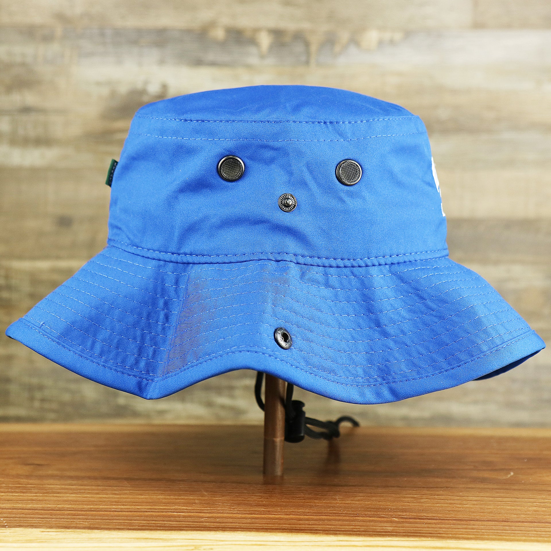 The wearer's right on the Ocean City New Jersey Wordmark Since 1897 Bucket Hat | Royal Blue Bucket Hat