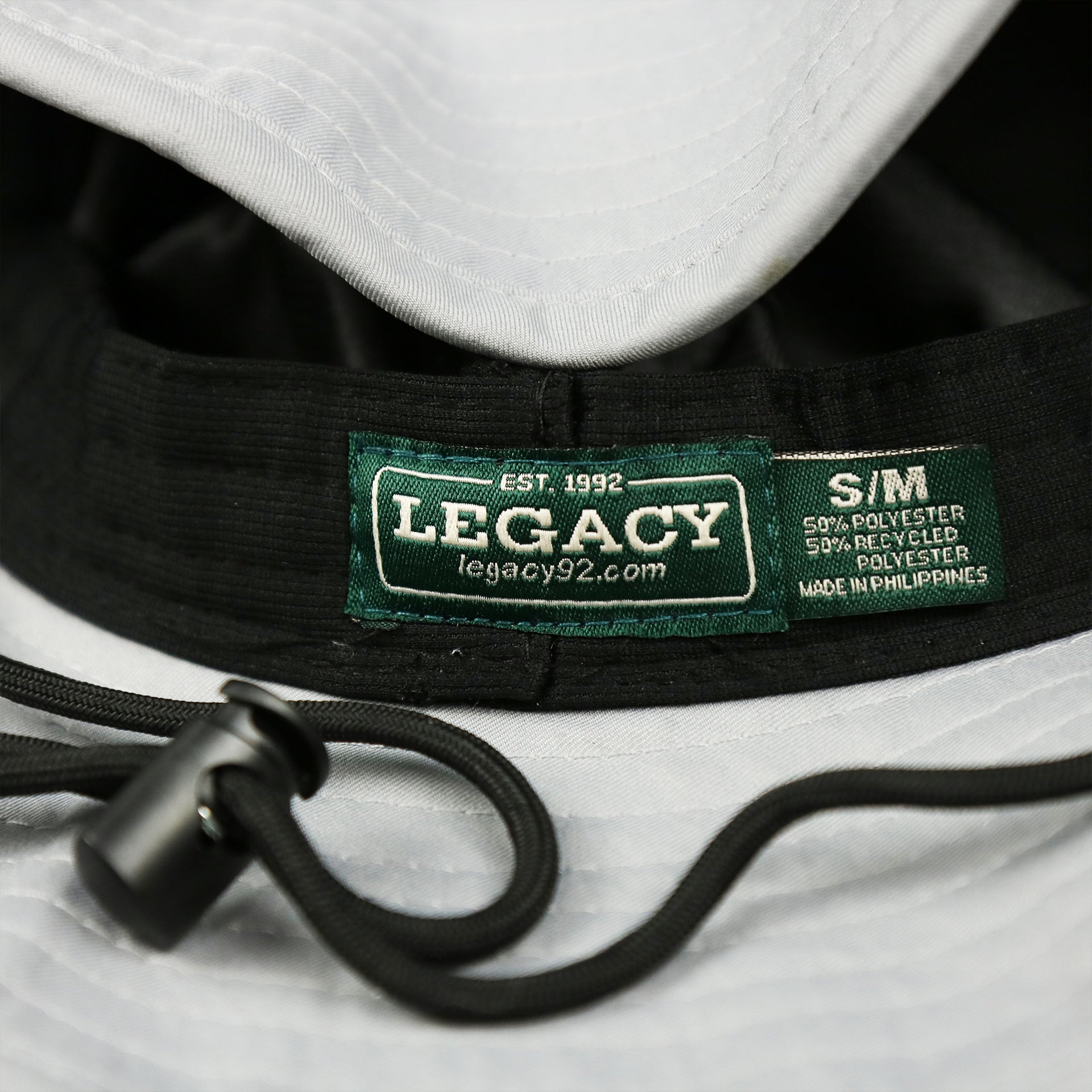 The Legacy Tag on the Ocean City New Jersey Wordmark Since 1897 Bucket Hat | Shark Grey Bucket Hat