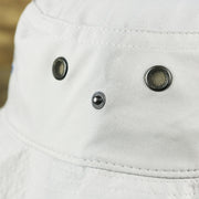 The buttons on the Ocean City New Jersey Wordmark Since 1897 Bucket Hat | Shark Grey Bucket Hat