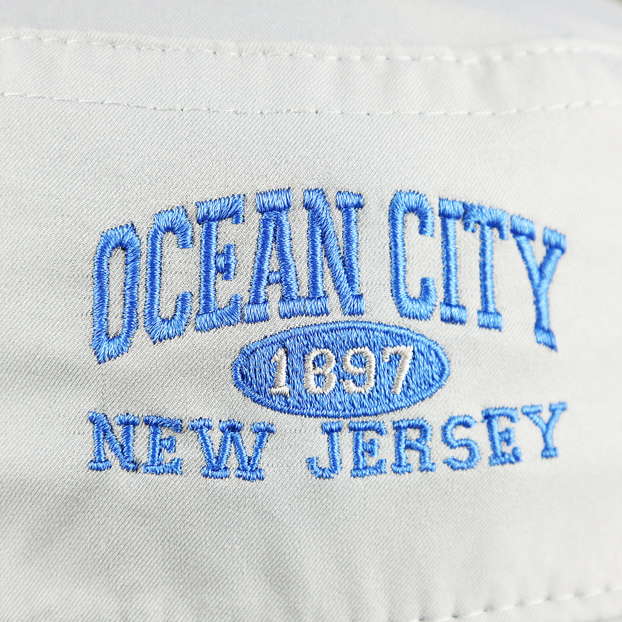 The Ocean City wordmark on the Ocean City New Jersey Wordmark Since 1897 Bucket Hat | Shark Grey Bucket Hat