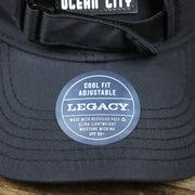 The Legacy Sticker on the New Jersey High Point PVC Ocean City Rubber Patch Cool Fit Adjustable Dad Hat | Black Dad Hat