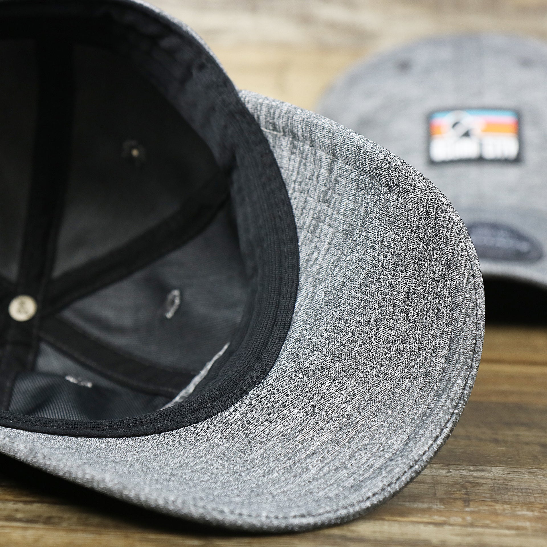The undervisor on the New Jersey High Point PVC Ocean City Rubber Patch Cool Fit Adjustable Dad Hat | Performance Gray Dad Hat
