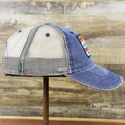 The wearer's right on the OCNJ 1879 Ocean City New Jersey Wave Denim Inspired Trucker Hat | Navy And Khaki Mesh Trucker Hat