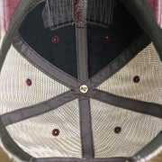 The inside of the OCNJ 1879 Ocean City New Jersey Wave Trucker Hat | Burgundy And Khaki Mesh Trucker Hat