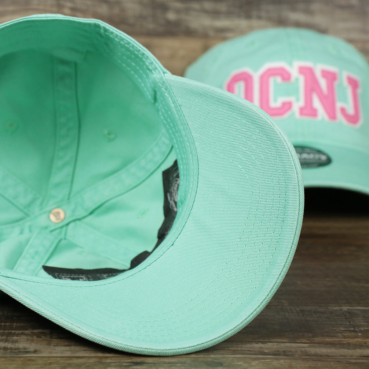 Youth Pink OCNJ Wordmark White Outline Dad Hat | Spearmint Youth Dad Hat