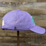The wearer's right on the Teal OCNJ Double Wordmark White Outline Bucket Hat | Lavender Bucket Hat