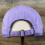 The backside of the Teal OCNJ Double Wordmark White Outline Bucket Hat | Lavender Bucket Hat
