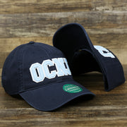 The Light Blue OCNJ Wordmark White Outline Dad Hat | Navy Blue Dad Hat