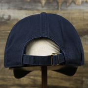 The backside of the Light Blue OCNJ Wordmark White Outline Dad Hat | Navy Blue Dad Hat