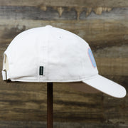 The wearer's right on the Light Blue OCNJ Wordmark Pink Outline Dad Hat | White Dad Hat