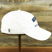 The wearer's right on the Ocean City New Jersey Wordmark Crossed Oars Logo Dad Hat | White Dad Hat