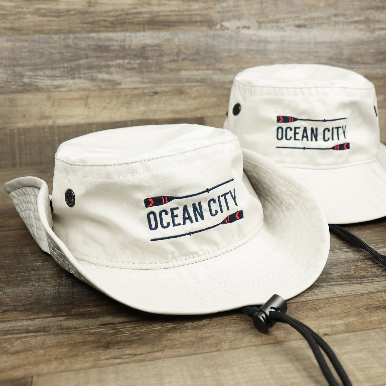 The Ocean City Wordmark Parallel Oars New Jersey Bucket Hat | Stone Bucket Hat