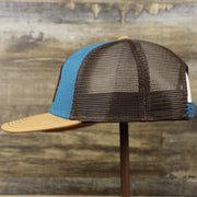 The wearer's left on the Ocean City Leather Tuna Patch New Jersey Mesh Back Trucker Hat | Marine Blue Mesh Trucker Hat