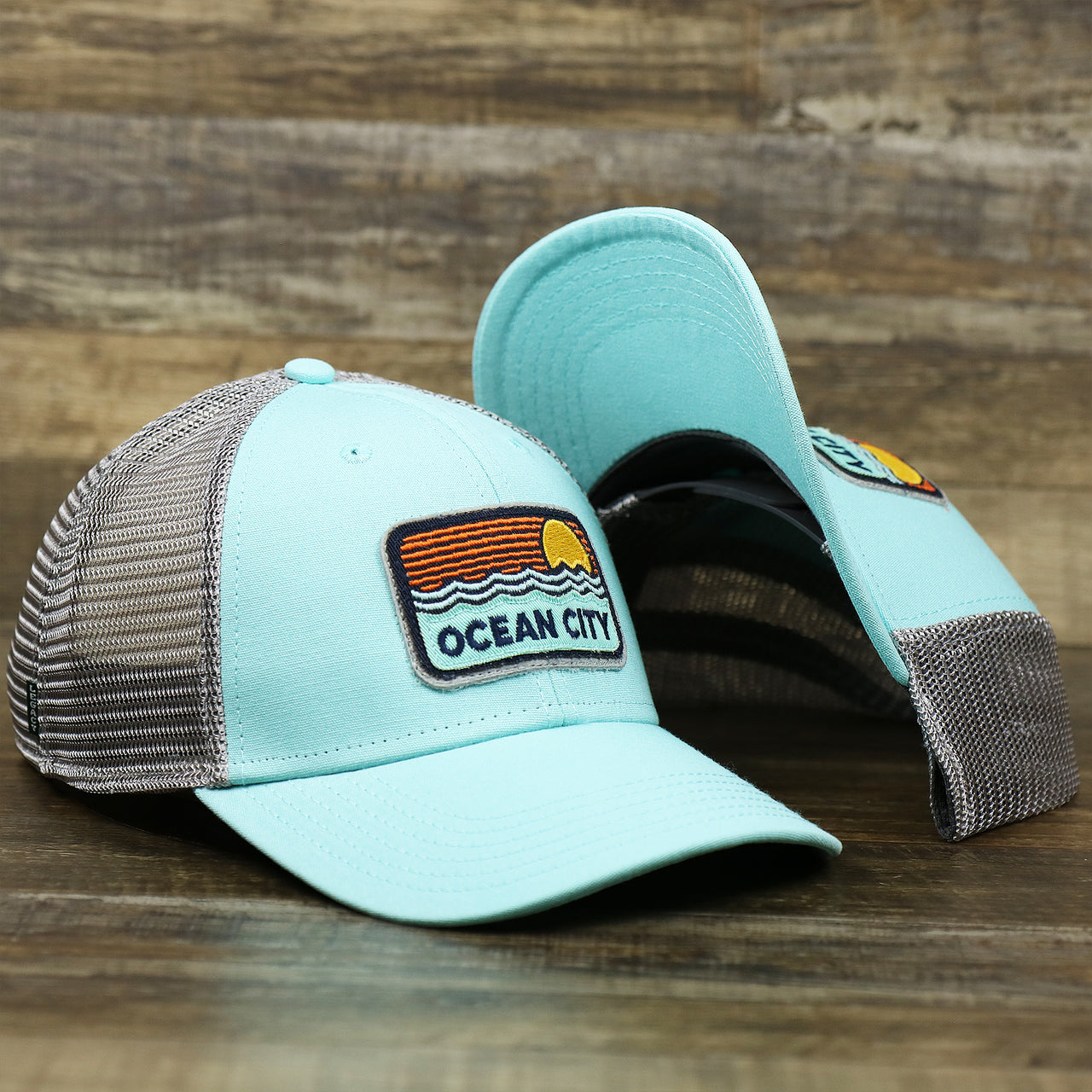 The New Jersey Ocean City Sunset Mesh Back Trucker Hat | Tahiti Blue And Grey Mesh Trucker Hat