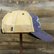 The wearer's right on the Ocean City Horizon Shark Vintage Mesh Back Worn Colorway Trucker Hat | Blue Trucker Hat