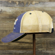 The wearer's left on the Ocean City Horizon Shark Vintage Mesh Back Worn Colorway Trucker Hat | Blue Trucker Hat