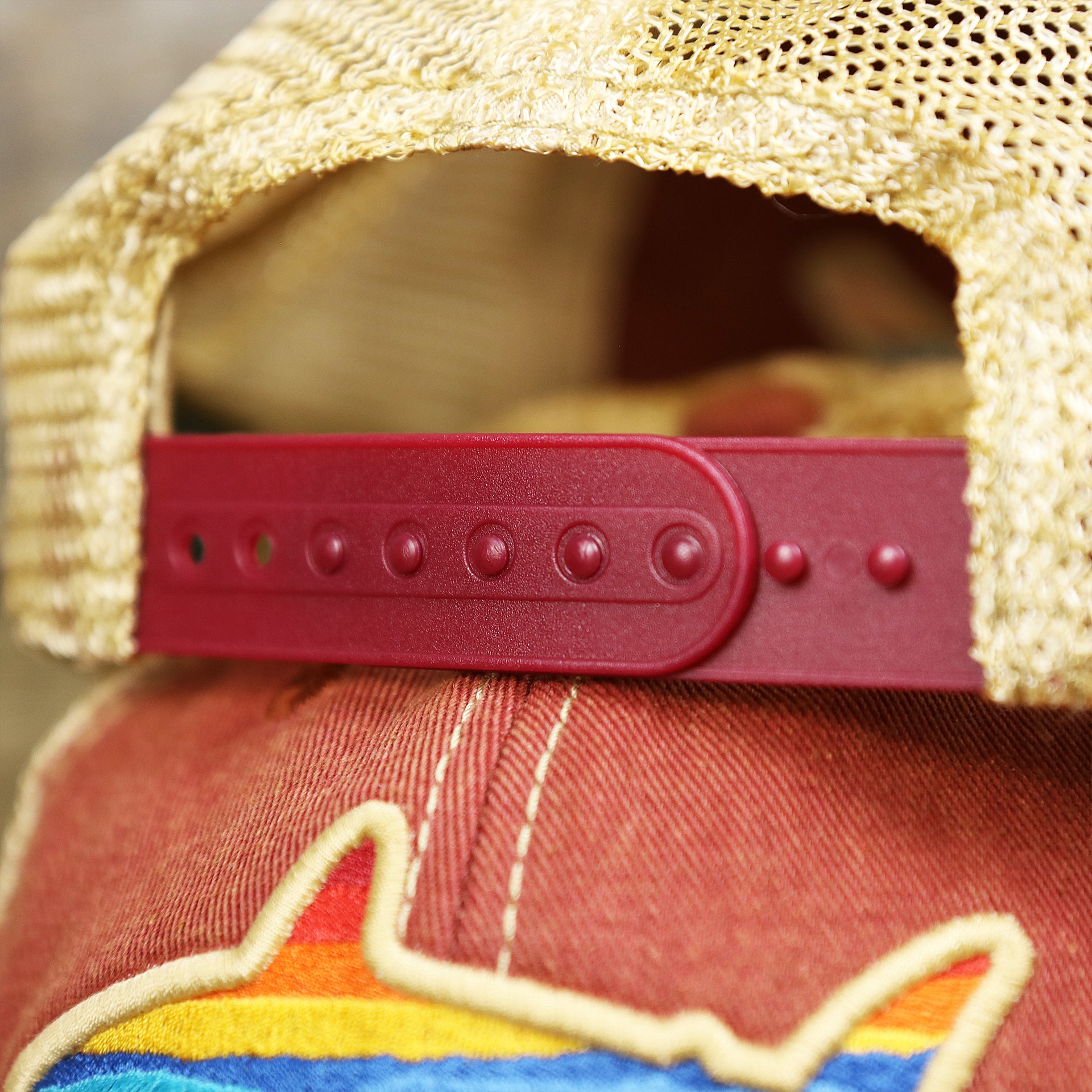 The Red Adjustable Strap on the Ocean City Horizon Shark Vintage Mesh Back Worn Colorway Trucker Hat | Cardinal Trucker Hat