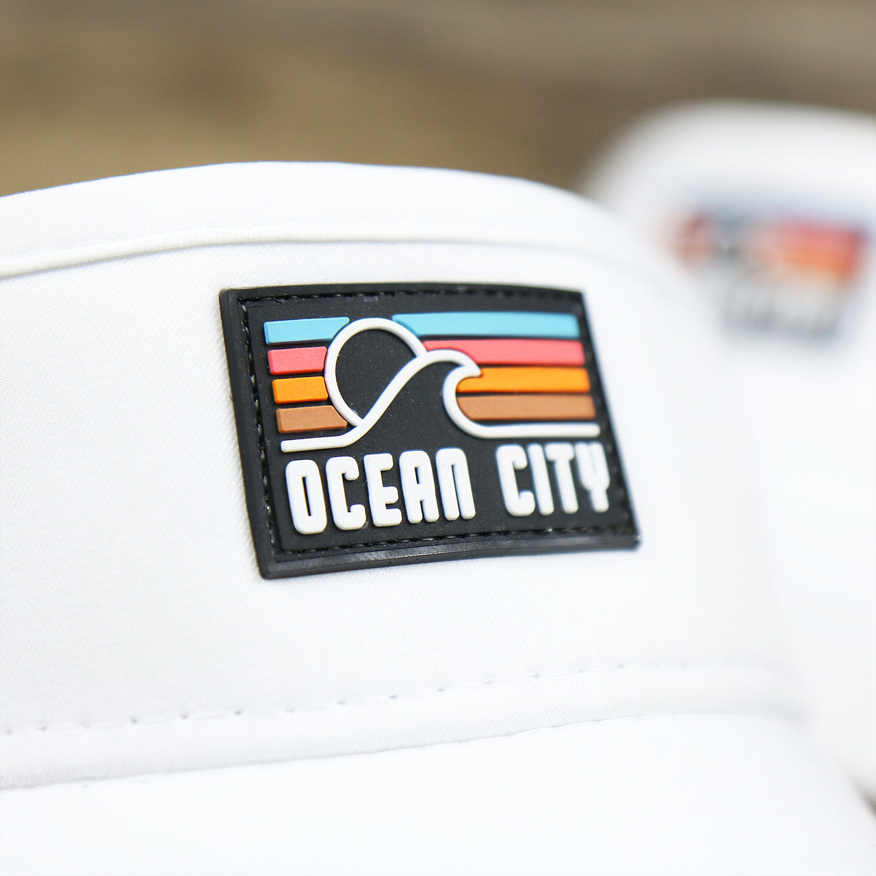 The Ocean City Sunset Rubber patch on the New Jersey High Point PVC Ocean City Rubber Patch Cool Fit Adjustable Visor | White Visor