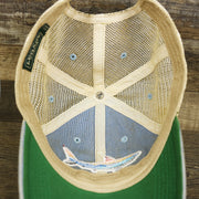 The inside of the Ocean City Horizon Shark Vintage Mesh Back Worn Colorway Trucker Hat | Light Blue Trucker Hat